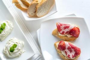 Sandwiches with cream cheese and ham photo