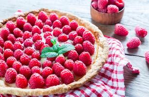 Raspberry tart with custard photo