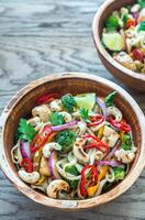 Two bowls of chicken noodle stir-fry photo