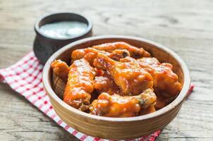 Bowl of buffalo chicken wings photo