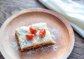 Lasagna with cherry tomatoes photo