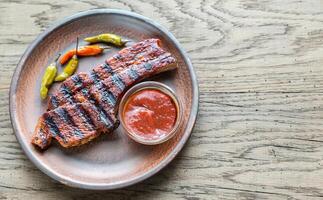 Portion of grilled pork ribs photo