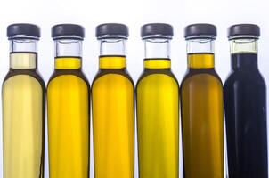 Bottles with different kinds of vegetable oil photo