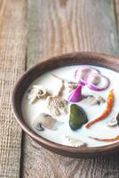 Bowl of thai tom kha kai soup photo