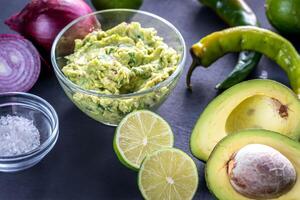 Guacamole with ingredients photo