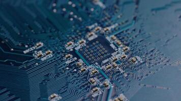 Computer electronic circuit board with radial conductor tracks and SMD capacitors rotating macro video