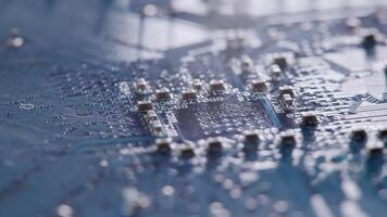 Computer electronic circuit board with radial conductor tracks and SMD capacitors rotating macro video