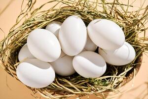 Wicker basket with farm natural white eggs. photo