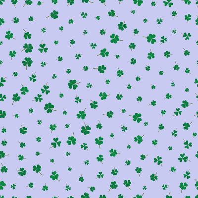Seamless pattern green clover leaves on a purple background. holiday print