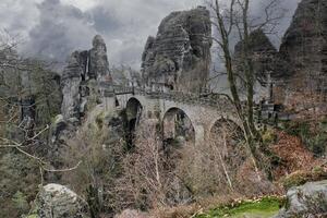 The Bastei Bridge in Saxon Switzerland. jagged rocks, viewing platform to Elbe. photo