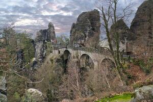 The Bastei Bridge in Saxon Switzerland. jagged rocks, viewing platform to Elbe. photo