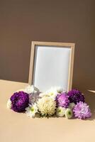 Holiday postcard greeting card photo frame empty paper note around mixed colorful flowers. Copy space mockup template. Minimalistic isometric style Advertisement sample