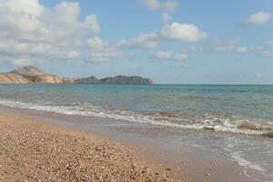 Beach Relaxation at the Black Sea. Fairy-tale Moments of a Sunny Day. The concept of tourism and sea travel photo