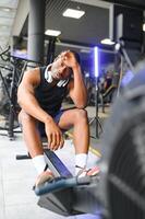 African American man working out in the gym. photo