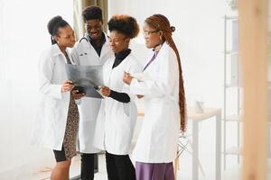 Group of doctors and nurses set in a hospital. photo