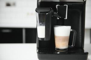 Cappuccino and espresso coffee machine photo