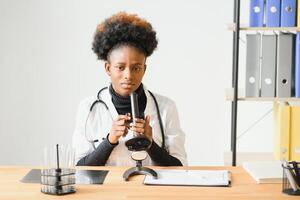 Portrait of a friendly black female doctor. photo