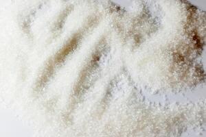 Sugar pile isolated on white background photo