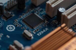 Technology, computer board with chips and transistors, concept. Ai and hardware. Silicon photo
