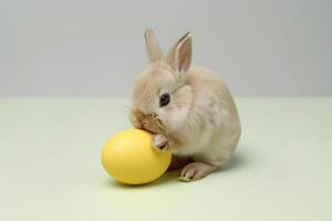 AI generated Cute bunny rabbit and easter egg. Concept of happy easter day. photo
