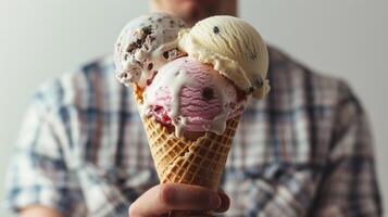 AI generated Close-up of the man holding an ice cream cone filled with scoops of delicious ice cream, with melted drips running down the sides, generative AI photo