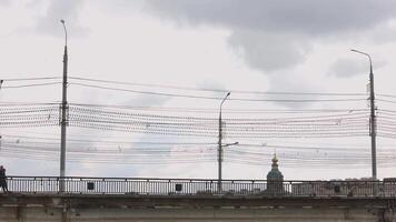 side view of cars and citizens passing over an old bridge in Tula, Russia - September 23, 2021 video