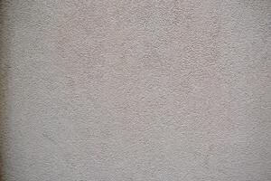 Stucco texture. Aged wallpaper. Vintage background photo