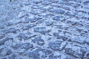 Cobbles texture with sand photo