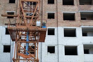 Construction of a multi storey residential building. Construction works photo