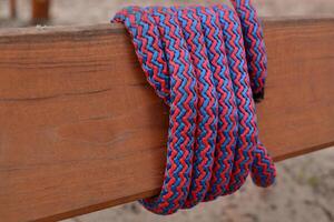 Knot on a colorful rope. Tools for climbing. photo