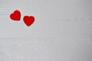 Love hearts on the white wooden background. Valentine's Day card photo