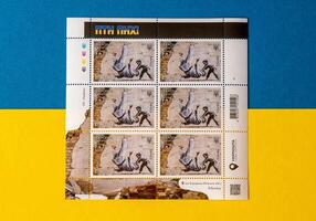 New Ukrainian stamp with Banksy graffiti in Borodyanka. PTN PNKh Dedicated to the anniversary of Russia's war against Ukraine. Defeat Putin Judo. Kyiv - 24 February 2023. photo