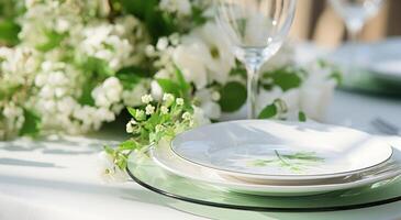AI generated white dinnerware on table with green flowers and white plates photo