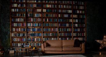 Book background. Selective focus. Blurred texture of old books. Bookshelves in the library photo