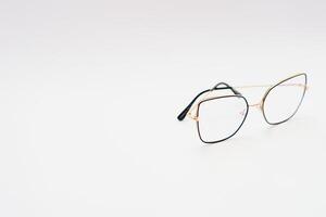 Black eyeglasses with white background photo