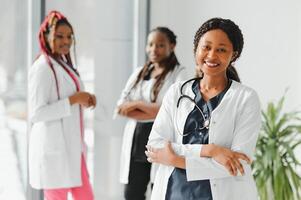 Group of doctors and nurses set in a hospital photo