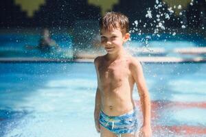 boy is in the water park. photo