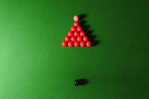 snooker balls on green surface, shallow depth of field photo