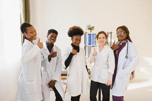 Group of doctors and nurses set in a hospital photo