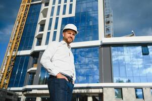 Portrait of an handsome engineer at work photo