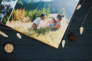 premium photo book, large size, natural wood cover, quality binding. Family photobook, recreation memories