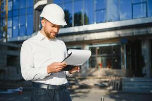 Portrait of an handsome young architect photo