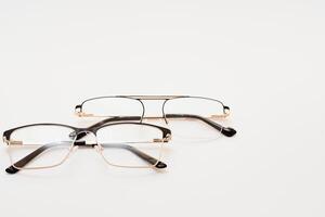 Black eyeglasses with white background photo