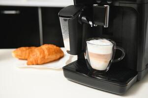 Cappuccino and espresso coffee machine photo