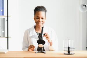 Medical doctor woman working at laboratory - copyspace. photo