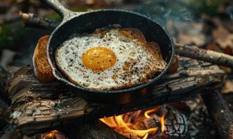 AI generated an egg cooked in a skillet next to toast on fire photo