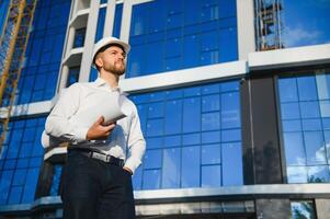 Portrait of an handsome engineer at work photo