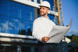 Portrait of an handsome young architect photo