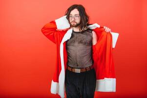 New Year's gay party. A gay man in a Santa suit. Equality. LGBT community. photo