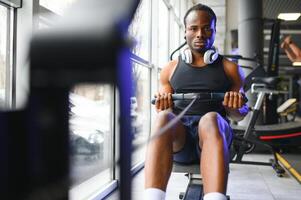 African American man working out in the gym. photo